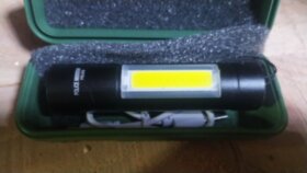 Фонарь  в кобуре зеленой YYC -510